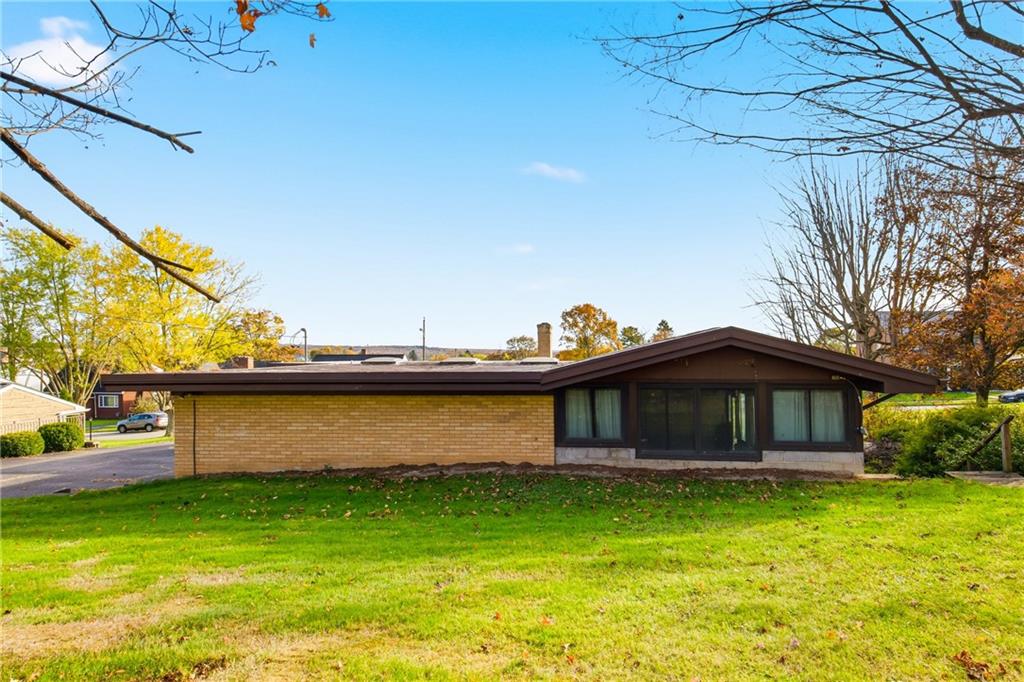 372 Lincoln Street Somerset, PA 15501 - Photo 42 of 50 a front view of a house with a garden