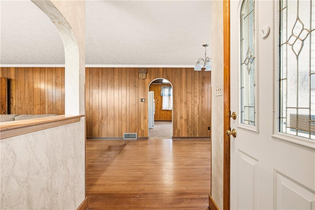 372 Lincoln Street Somerset, PA 15501 - Photo 6 of 50 a view of a hallway with wooden floor and windows