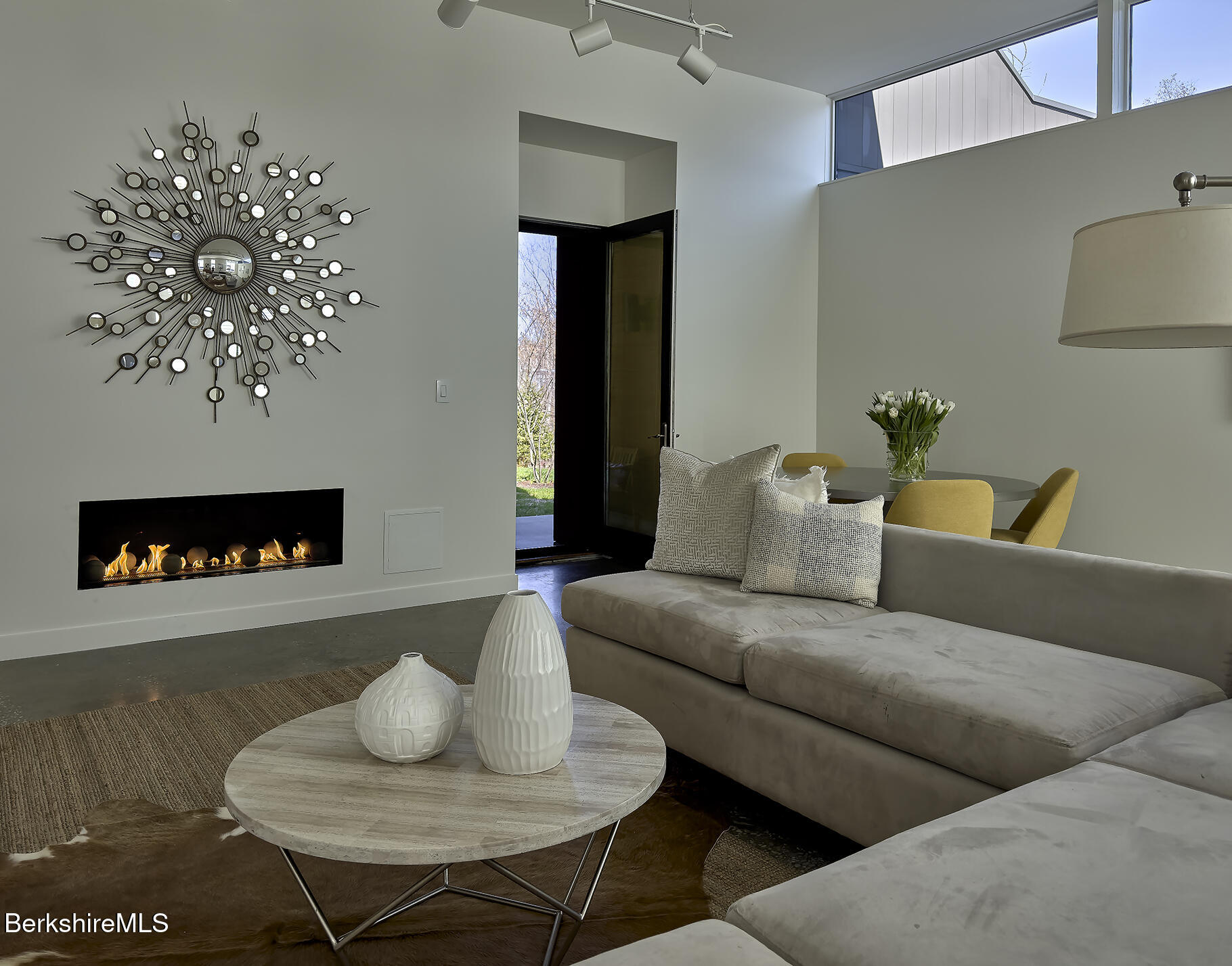 1 River Run Road, Unit 1 Williamstown, MA 01267 - Photo 3 of 15 a living room with furniture and a fireplace