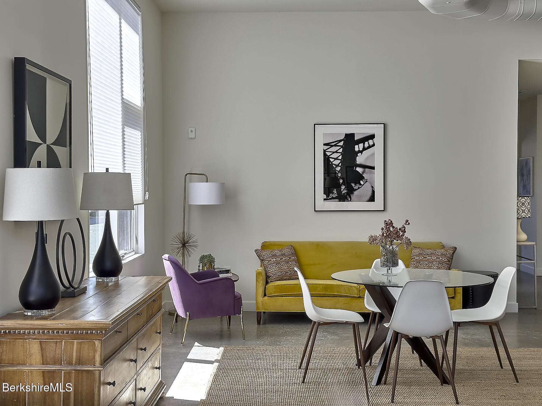 1 River Run Road, Unit 1 Williamstown, MA 01267 - Photo 4 of 15 a view of a dining room with furniture and wooden floor