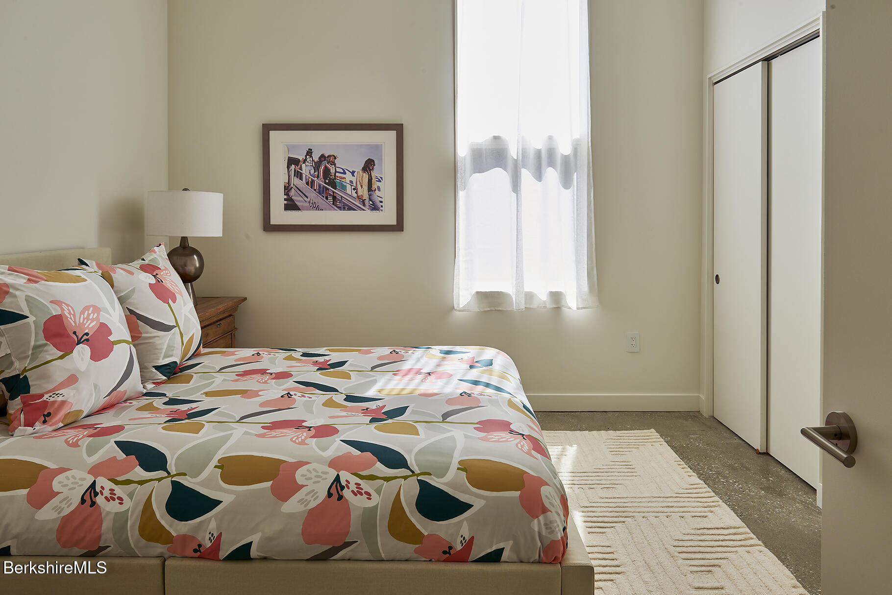 1 River Run Road, Unit 1 Williamstown, MA 01267 - Photo 9 of 15 a bedroom with a bed and a painting on the wall