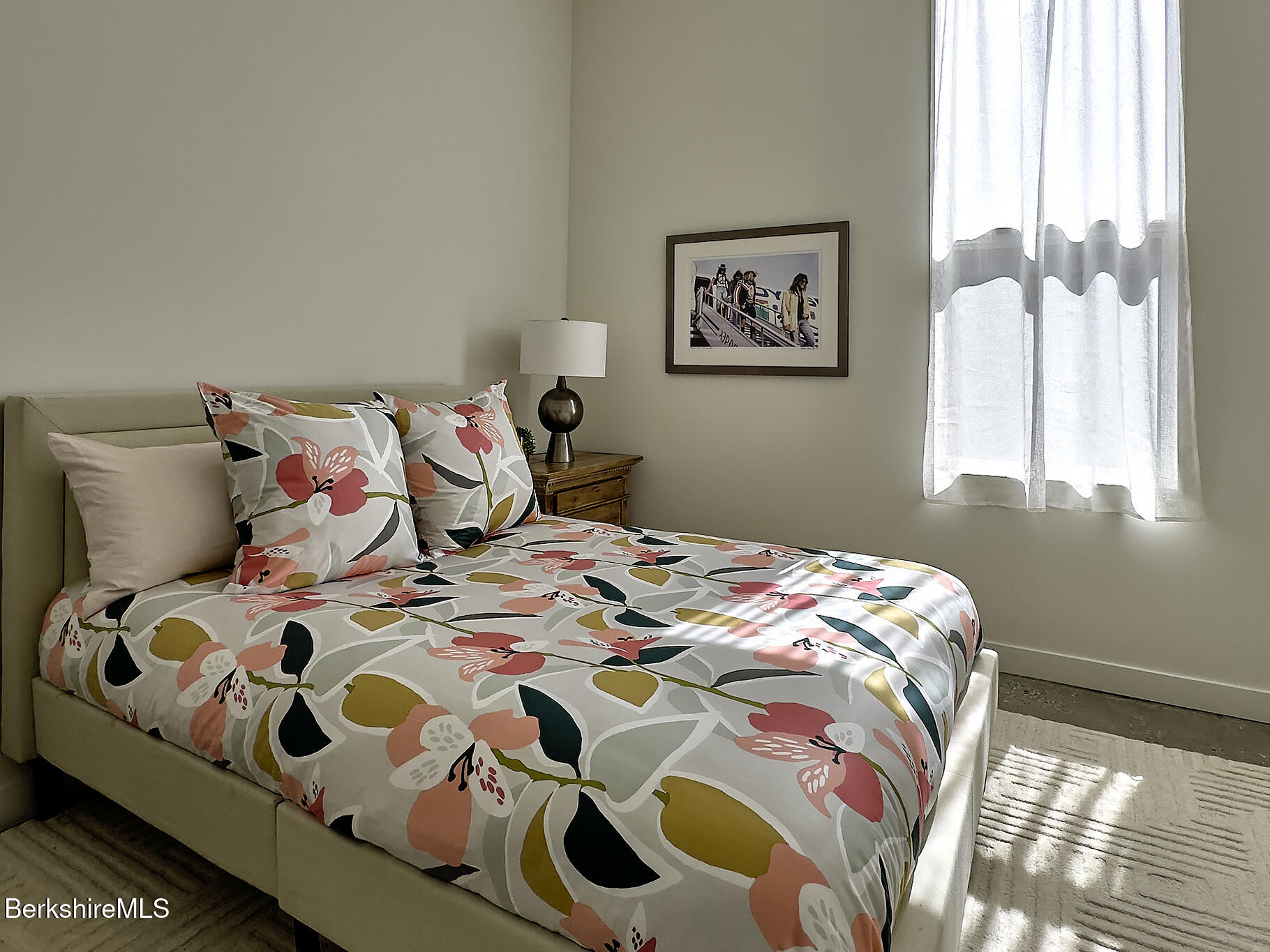 1 River Run Road, Unit 1 Williamstown, MA 01267 - Photo 10 of 15 a bedroom with a bed and a painting on the wall