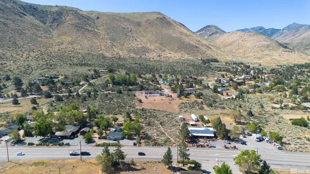 an aerial view of residential house and outdoor space
