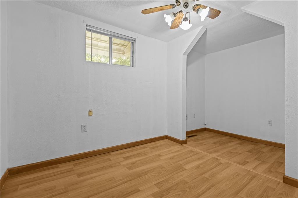 319 Center Grange Road Monaca, PA 15061 - Photo 15 of 24 a view of an empty room with a window
