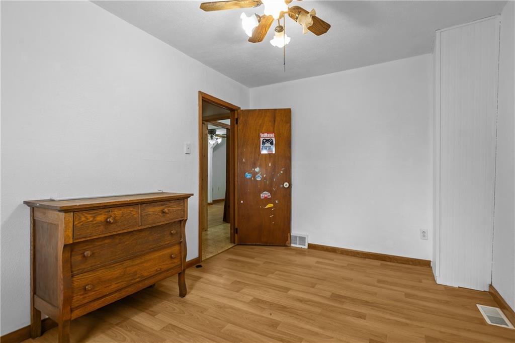 319 Center Grange Road Monaca, PA 15061 - Photo 20 of 24 a view of an empty room with wooden floor