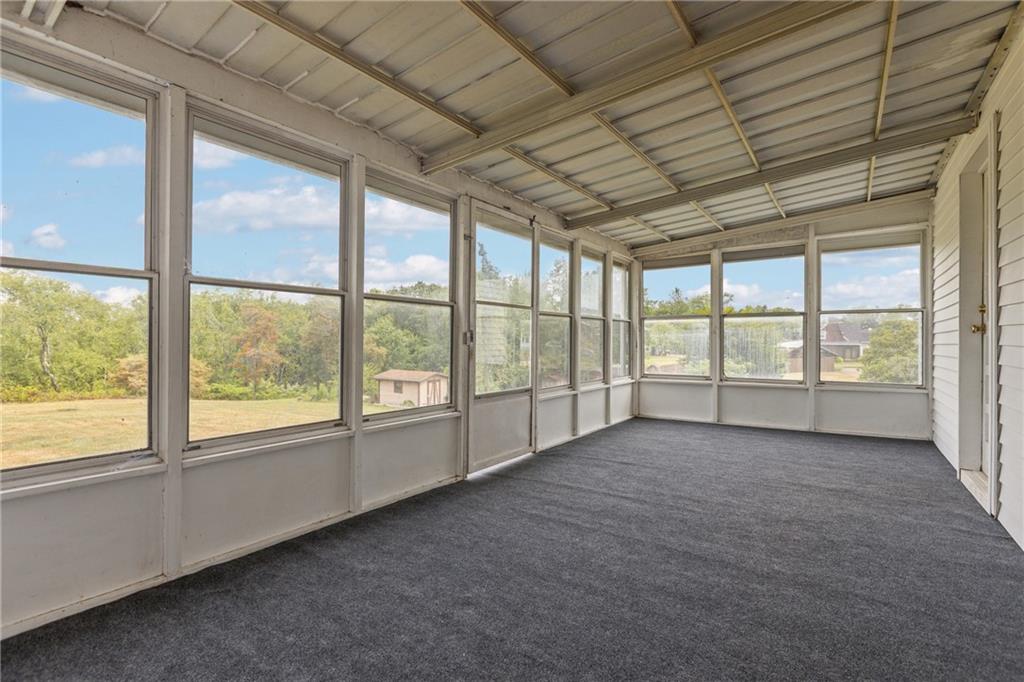 319 Center Grange Road Monaca, PA 15061 - Photo 21 of 24 a view of an empty room with a balcony