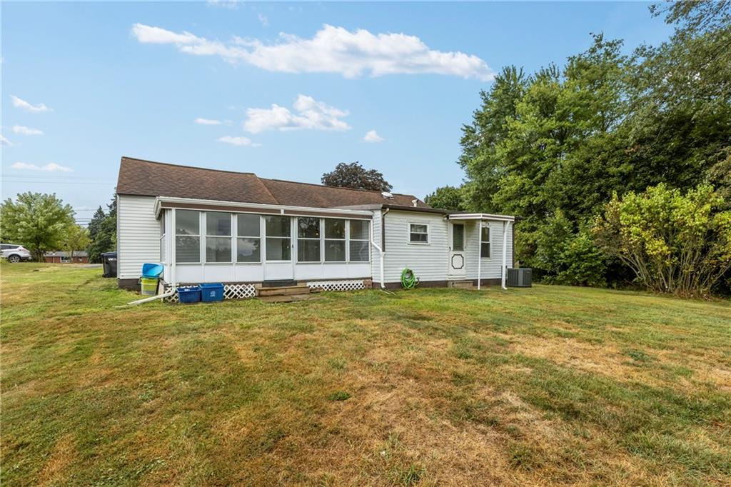 319 Center Grange Road Monaca, PA 15061 - Photo 24 of 24 a view of a house with a backyard