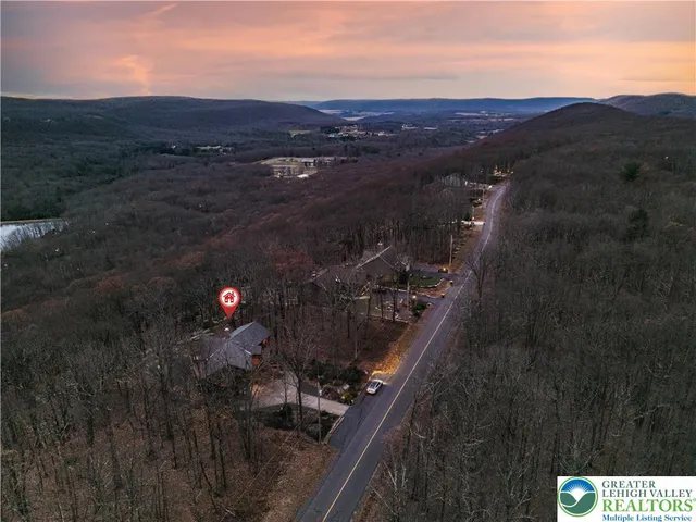 a bathroom with a sink vanity and mirror