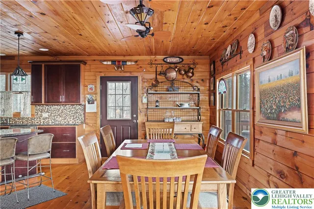 a bedroom with bed and a window