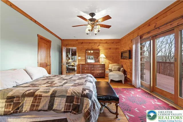 a room with gym equipment and a large window