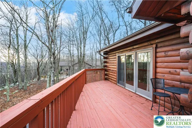 a view of a chairs and table in a patio