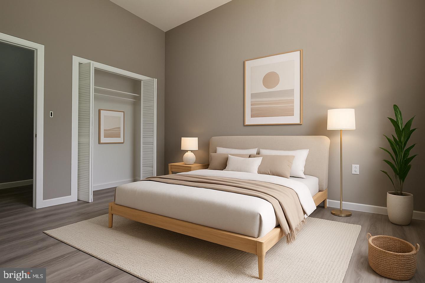 1218 North 16th Street Philadelphia, PA 19121 - Photo 22 of 33 a bedroom with bed and a potted plant