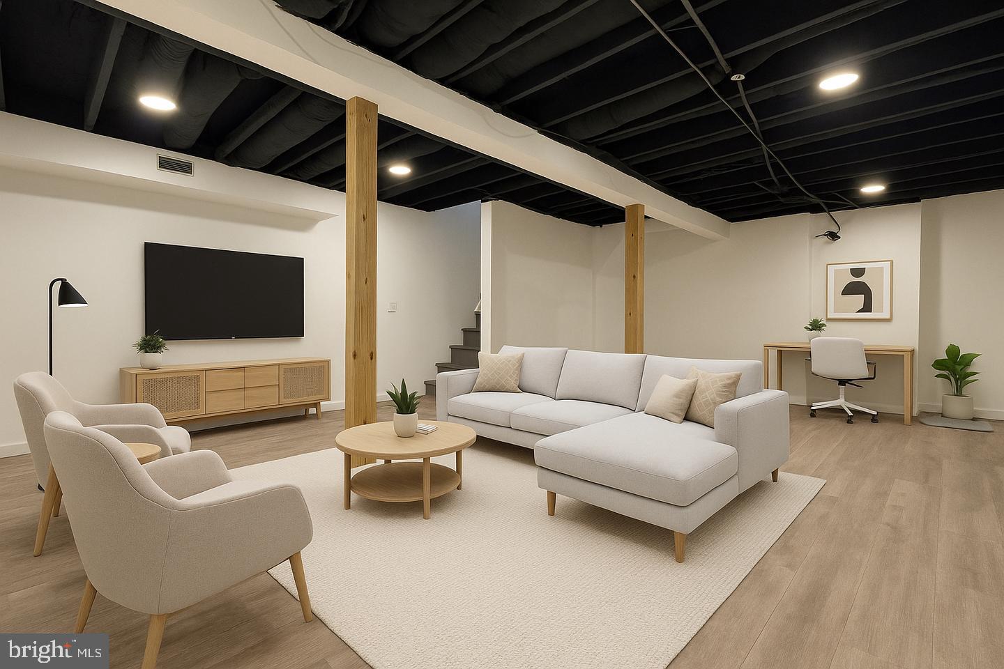 1218 North 16th Street Philadelphia, PA 19121 - Photo 28 of 33 a living room with furniture and a flat screen tv