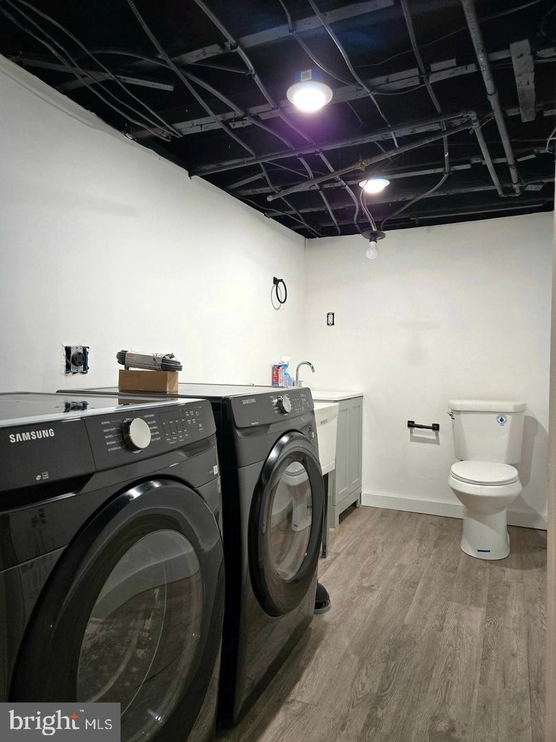 1218 North 16th Street Philadelphia, PA 19121 - Photo 33 of 33 a utility room with dryer and washer