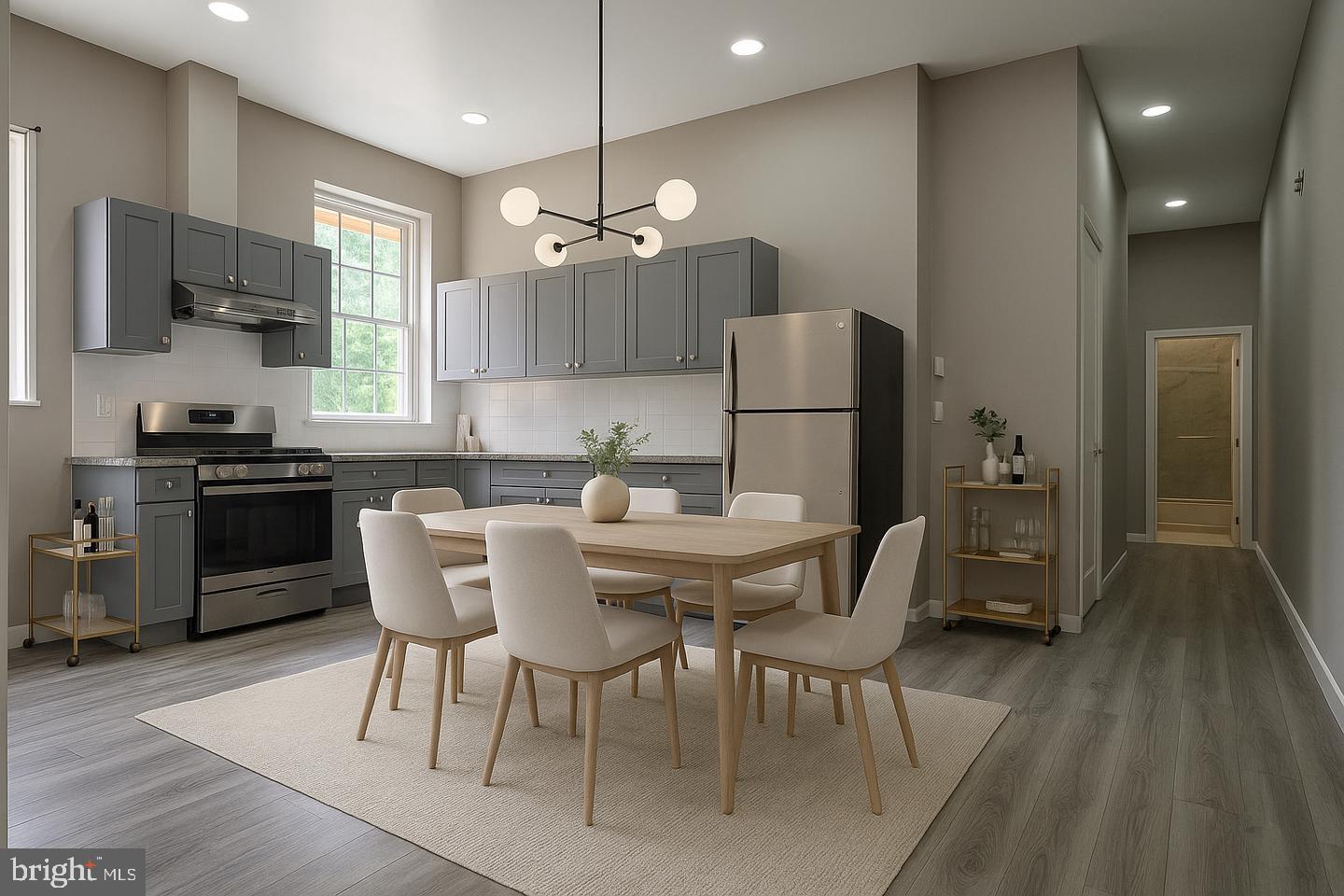 1218 North 16th Street Philadelphia, PA 19121 - Photo 4 of 33 a view of a dining room with furniture a chandelier and wooden floor