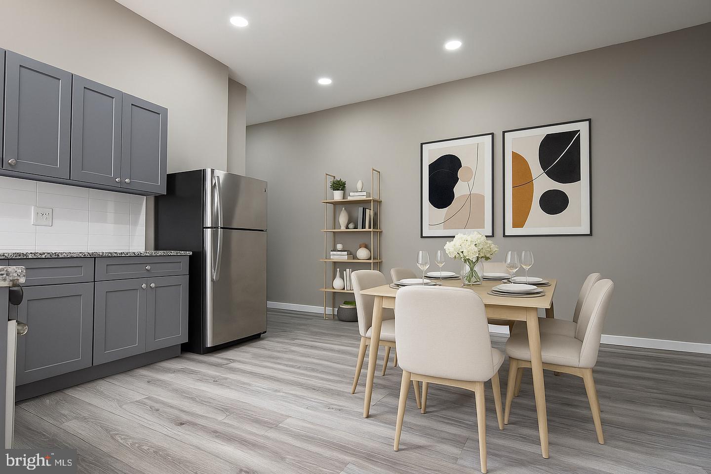 1218 North 16th Street Philadelphia, PA 19121 - Photo 10 of 33 a view of kitchen with refrigerator and wooden cabinets