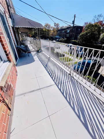 a view of balcony with furniture