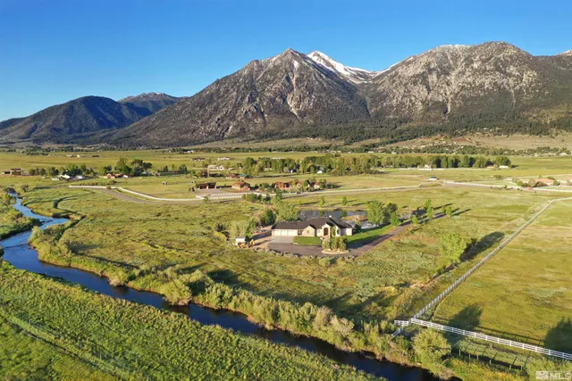a view of an ocean and a mountain