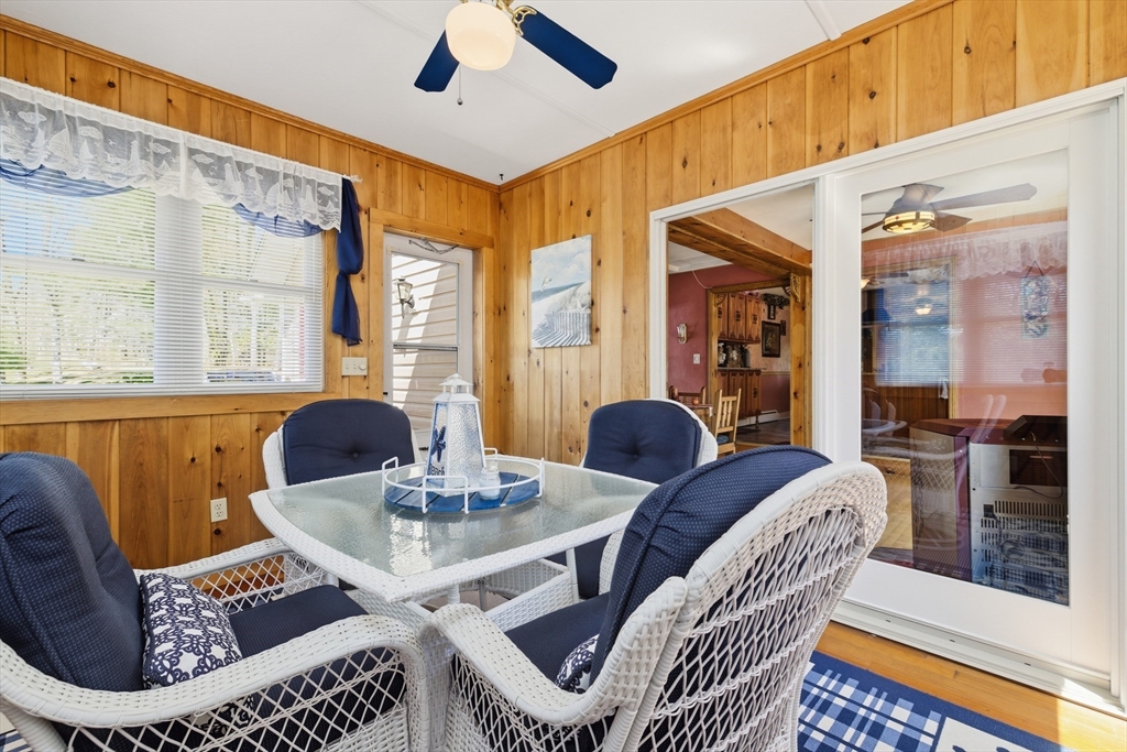 284 North Woodstock Road Southbridge, MA 01550 - Photo 14 of 42 a living room with furniture a table and a large window
