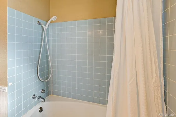 a bathroom with a bath tub