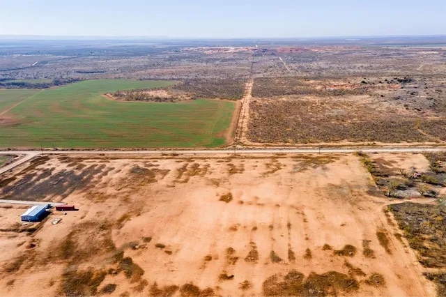 a view of city with ocean