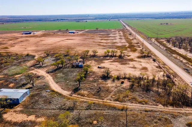 a view of outdoor space with a lake view