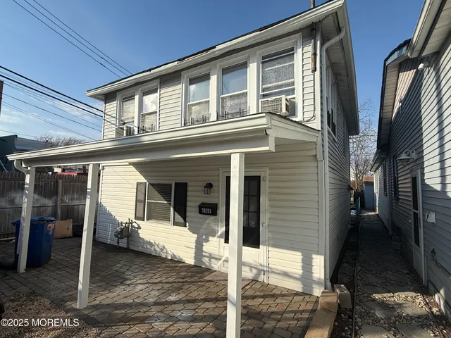 a view of a house with a porch