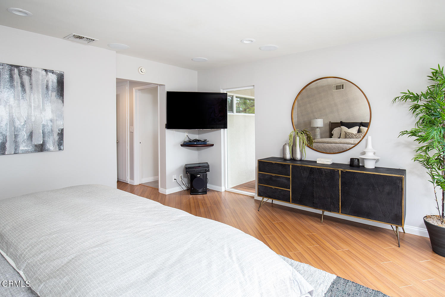 1400 Edgecliff Lane Pasadena, CA 91107 - Photo 23 of 43 a bedroom with a bed and a television