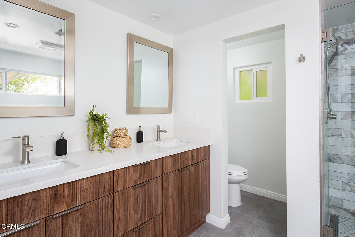 1400 Edgecliff Lane Pasadena, CA 91107 - Photo 28 of 43 a bathroom with a toilet sink and mirror