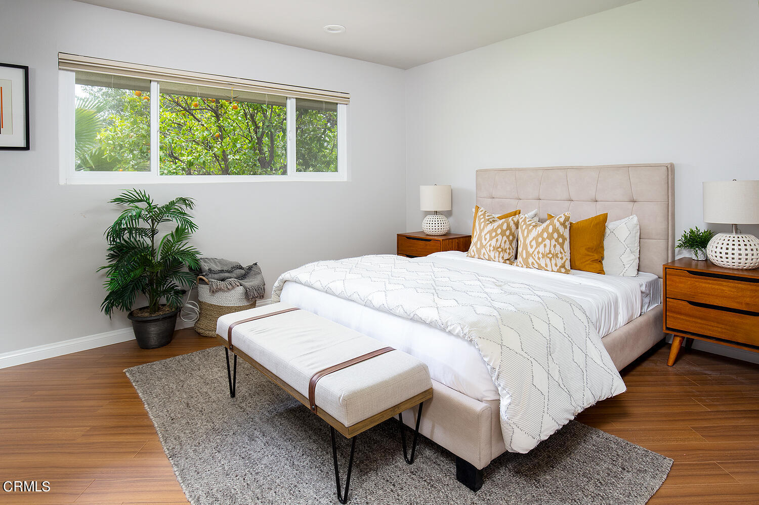 1400 Edgecliff Lane Pasadena, CA 91107 - Photo 29 of 43 a bed sitting in a bedroom next to a window