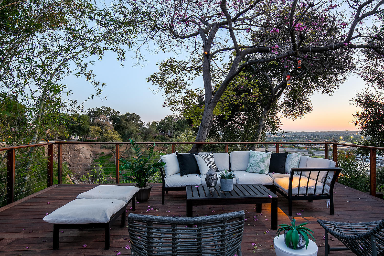 1400 Edgecliff Lane Pasadena, CA 91107 - Photo 37 of 43 a patio with couches table and chairs with wooden floor and fence