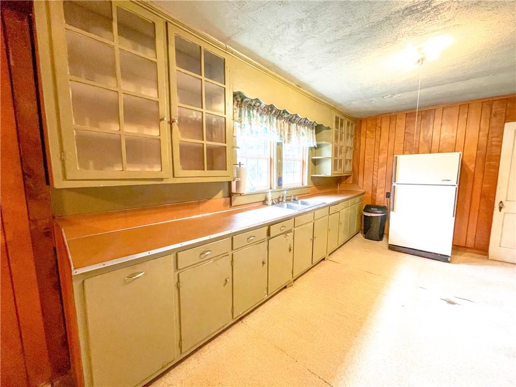 8548 Jc Road Vale, NC 28168 - Photo 11 of 20 a large white kitchen with sink and refrigerator
