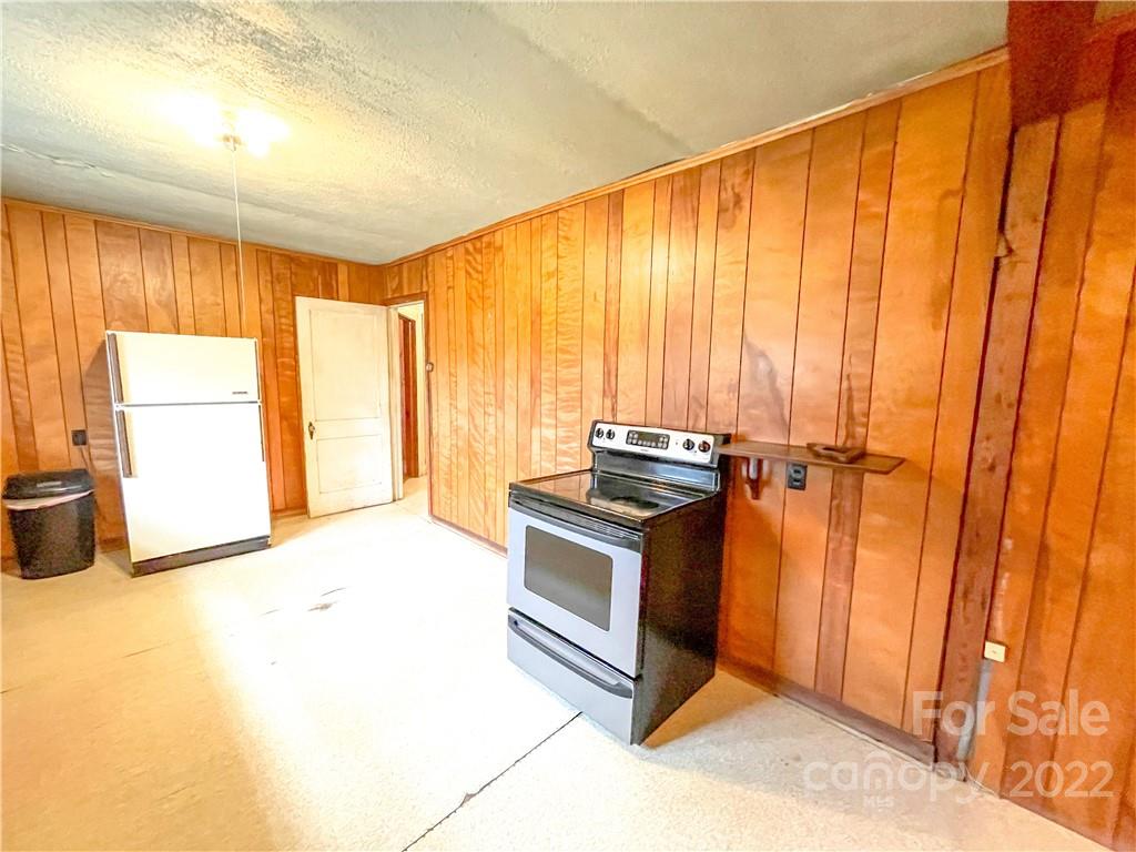8548 Jc Road Vale, NC 28168 - Photo 12 of 20 a view of a room with a window and a kitchen