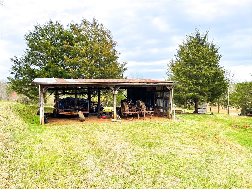 8548 Jc Road Vale, NC 28168 - Photo 18 of 20 a view of a house with swimming pool and sitting area