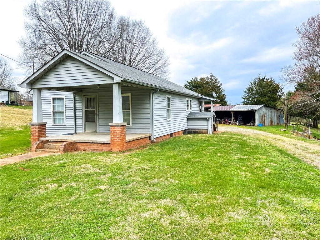 8548 Jc Road Vale, NC 28168 - Photo 3 of 20 a front view of house with yard and green space