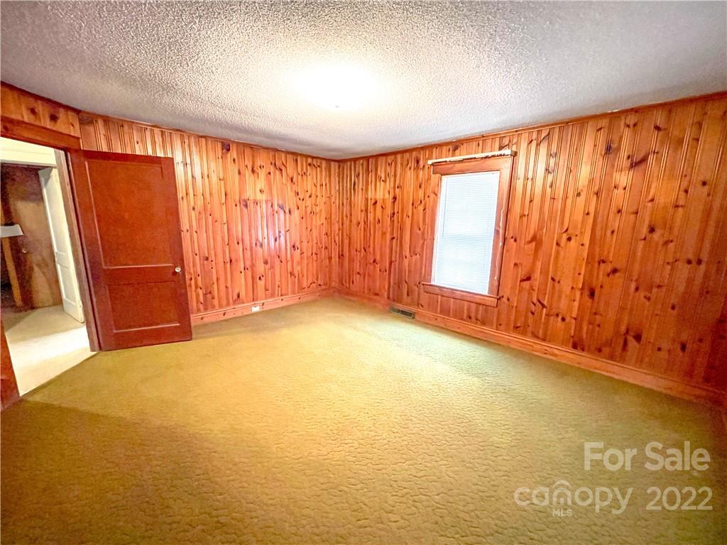 8548 Jc Road Vale, NC 28168 - Photo 8 of 20 a view of an empty room with a window