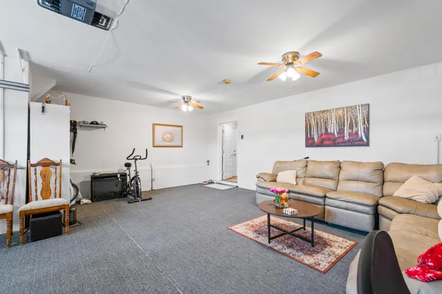 a living room with furniture and a couch