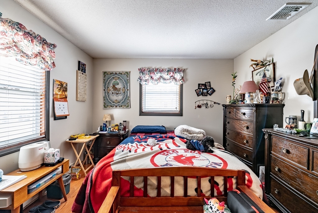 220 Senator Street Springfield, MA 01129 - Photo 27 of 33 a bedroom with furniture and a window