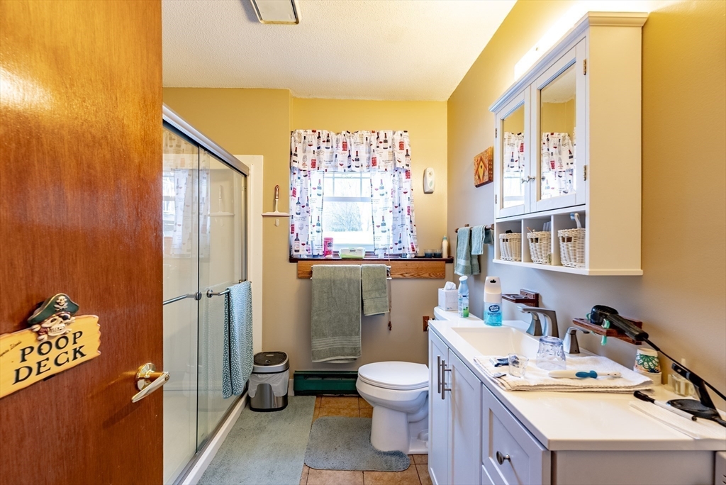 220 Senator Street Springfield, MA 01129 - Photo 29 of 33 a bathroom with a sink toilet and shower