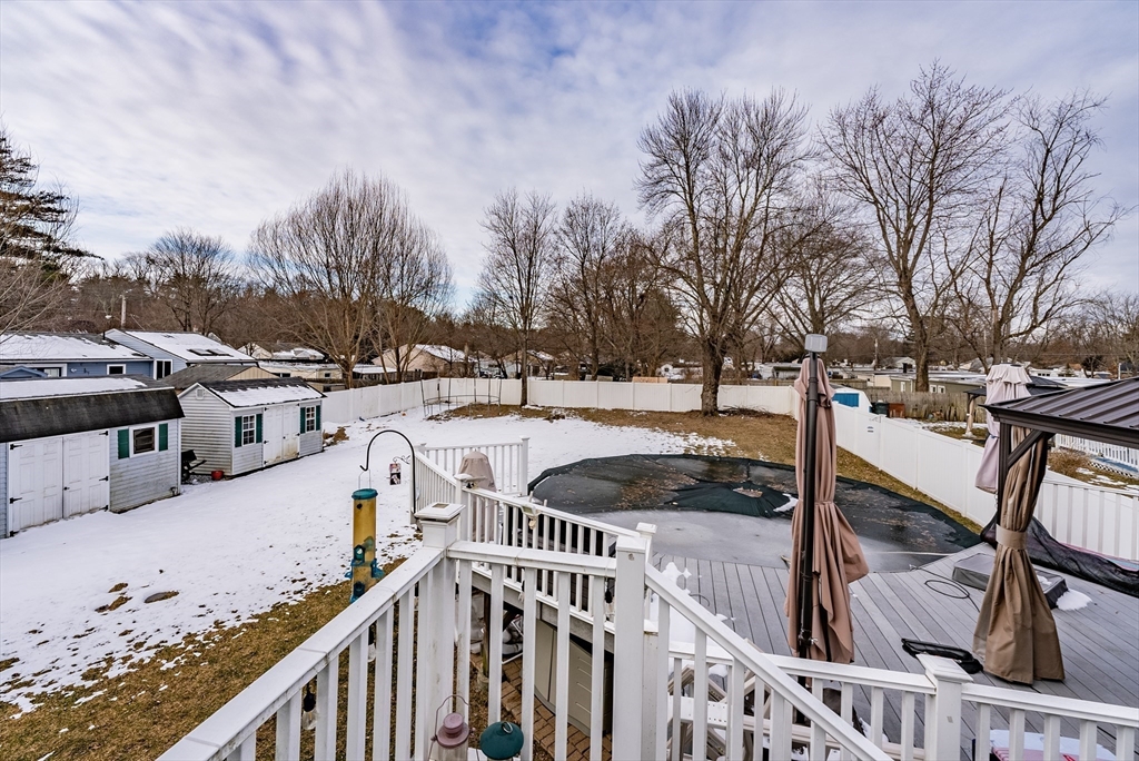 220 Senator Street Springfield, MA 01129 - Photo 9 of 33 a view of a house with wooden fence