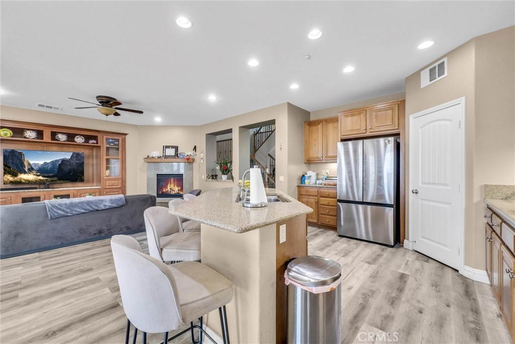 18388 Hidden Ranch Road Riverside, CA 92508 - Photo 15 of 46 a living room with furniture and a flat screen tv