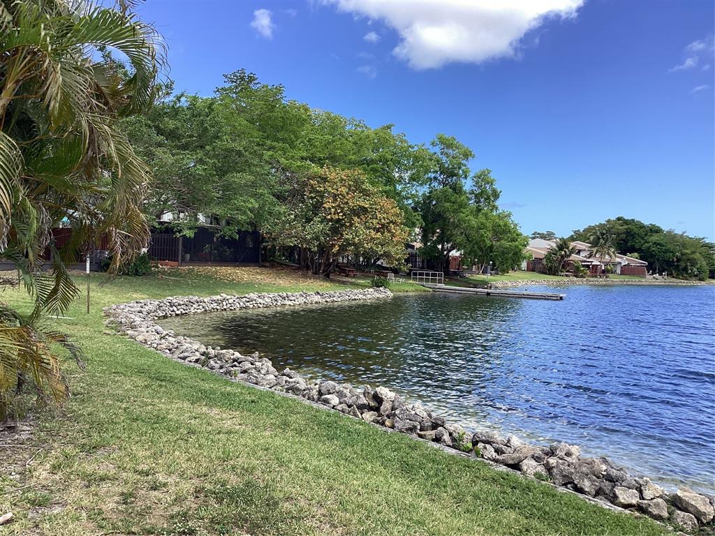 Ives Estates Miami, FL 33179 - Photo 7 of 15 a view of a lake with a yard