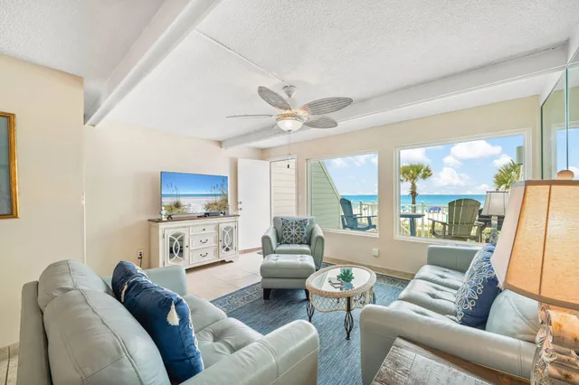 a view of a patio with iron fence