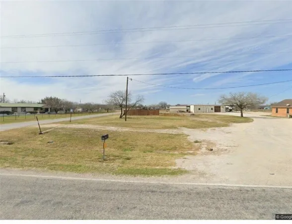 a view of a lake with a big yard