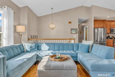 a living room with furniture and a couch