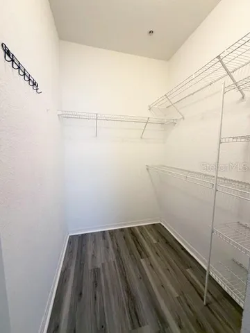 a view of a room with racks on the wall