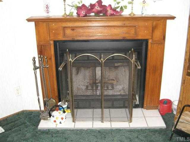 7395 C Elevation Road Benson, NC 27504 - Photo 4 of 12 Currently a Wood Burning Fireplace, but can be converted to Gas Logs Den/Family/Great Room