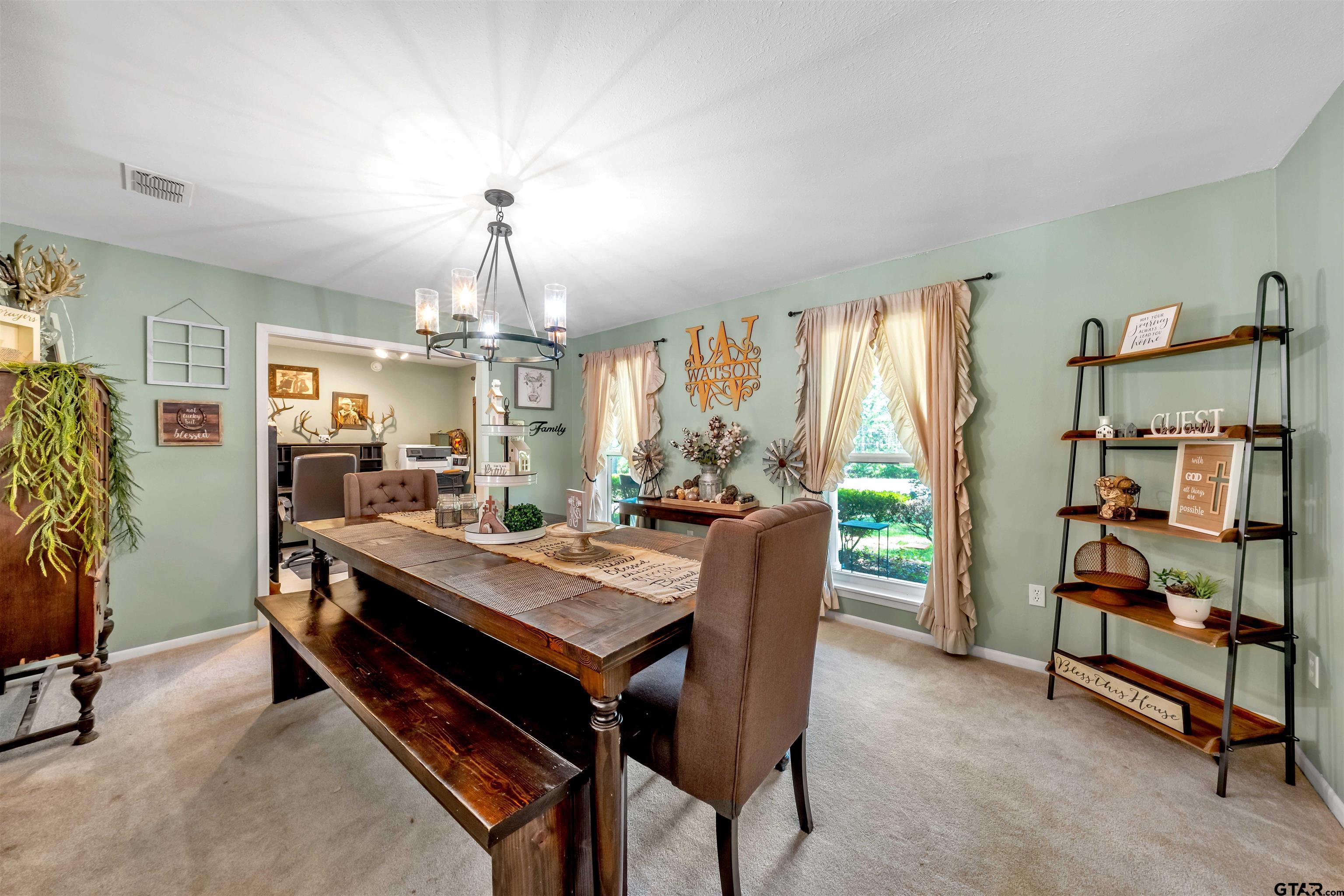 1084 South Main Rusk, TX 75785 - Photo 6 of 26 a view of a dining room with furniture window and wooden floor