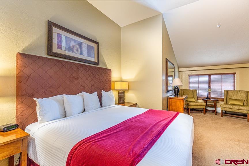 24 Sheol Street, Unit 503 R23 Durango, CO 81301 - Photo 23 of 44 a bedroom with bed and wooden floor