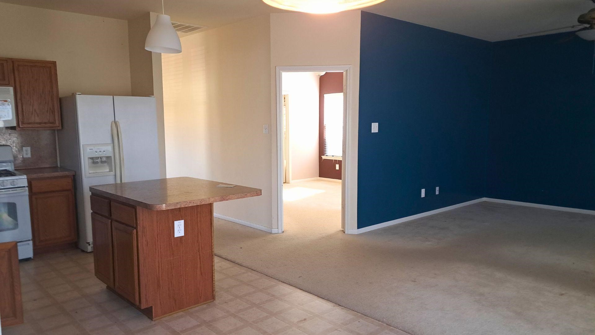 21842 Grassy Hill Lane Spring, TX 77388 - Photo 3 of 9 a kitchen with stainless steel appliances granite countertop a stove a refrigerator a sink and a refrigerator